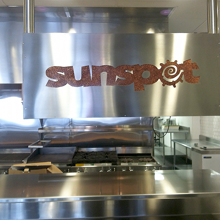 Stainless and copper signage